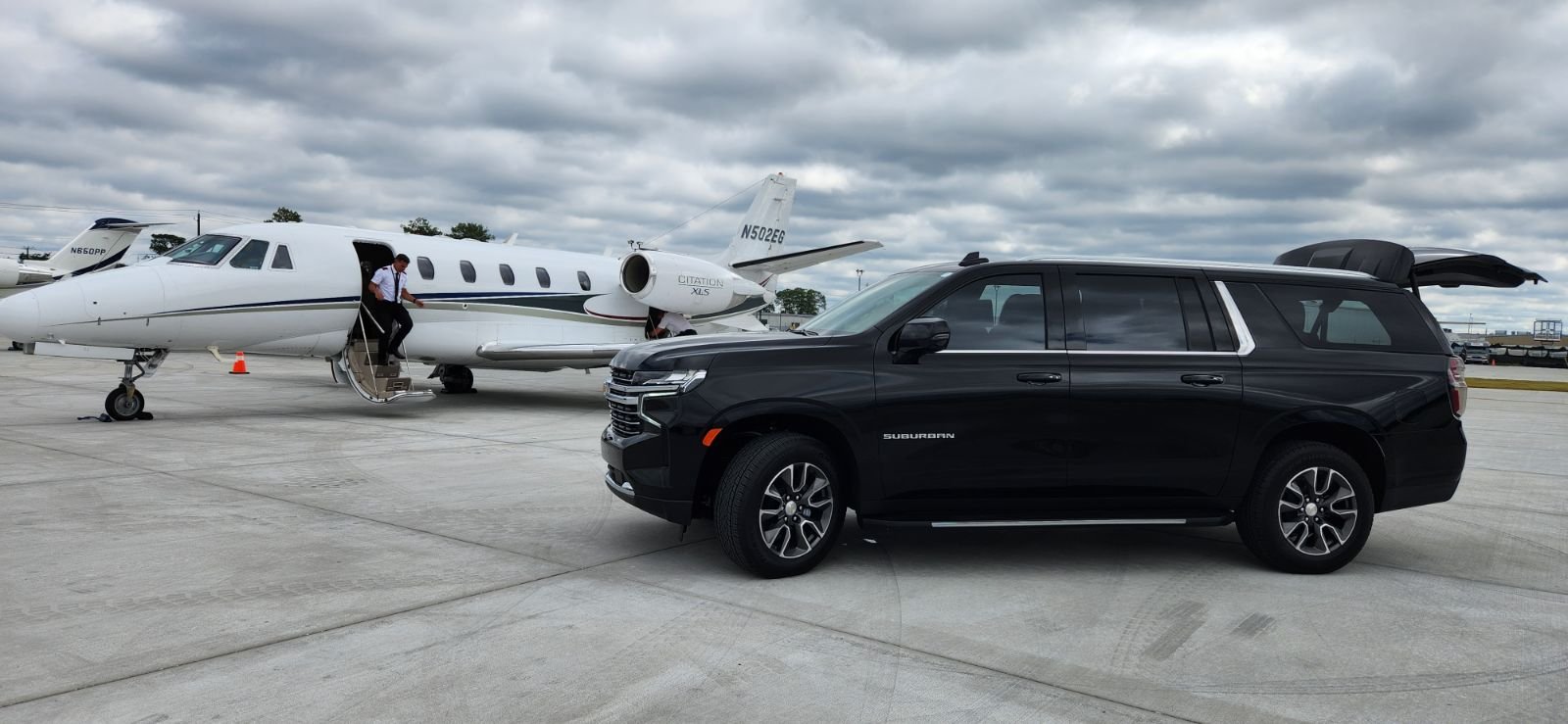 Premium airport transportation SUV at airport terminal